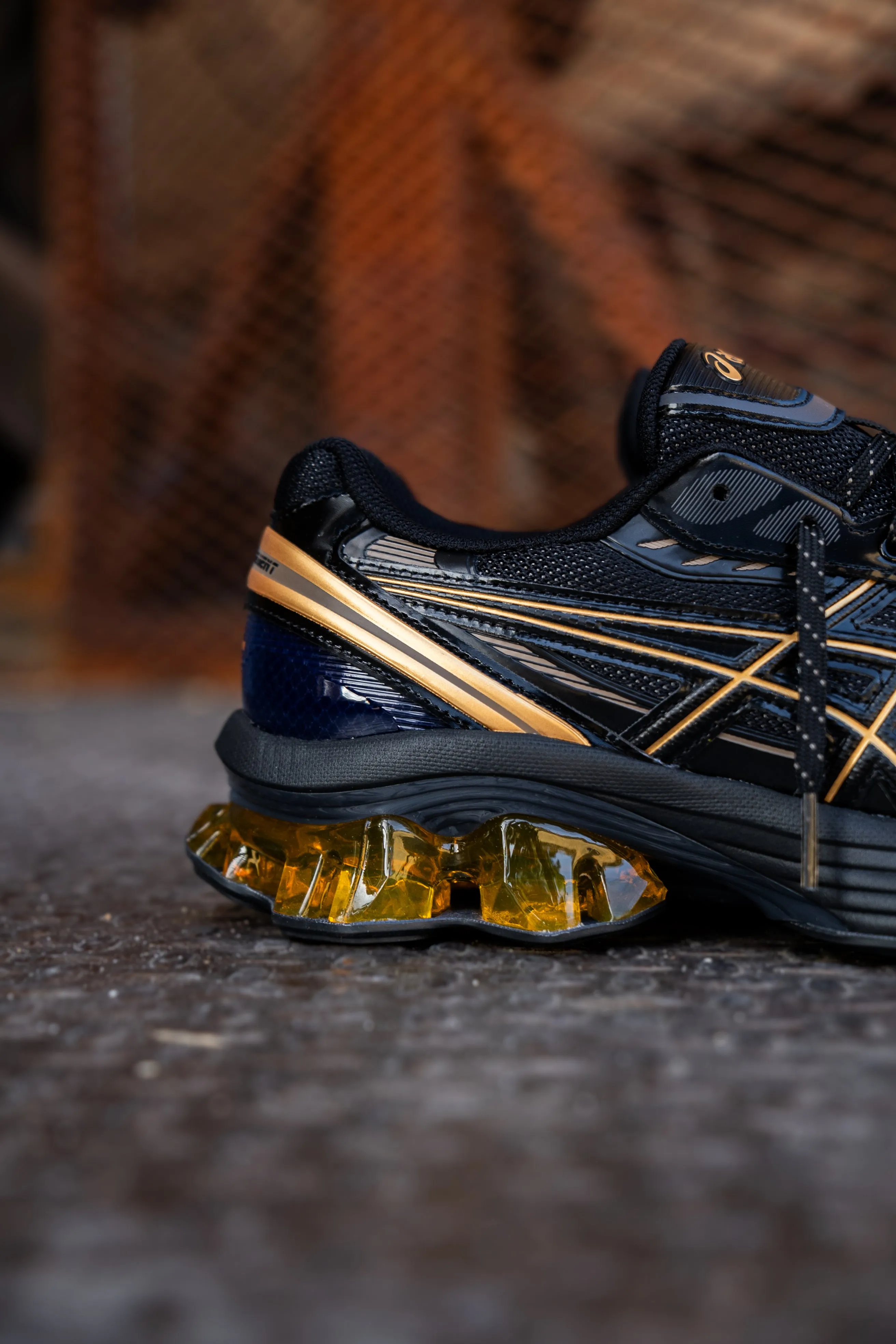 Herren Asics Gel-Kinetic Fluent (Schwarz/Gold)