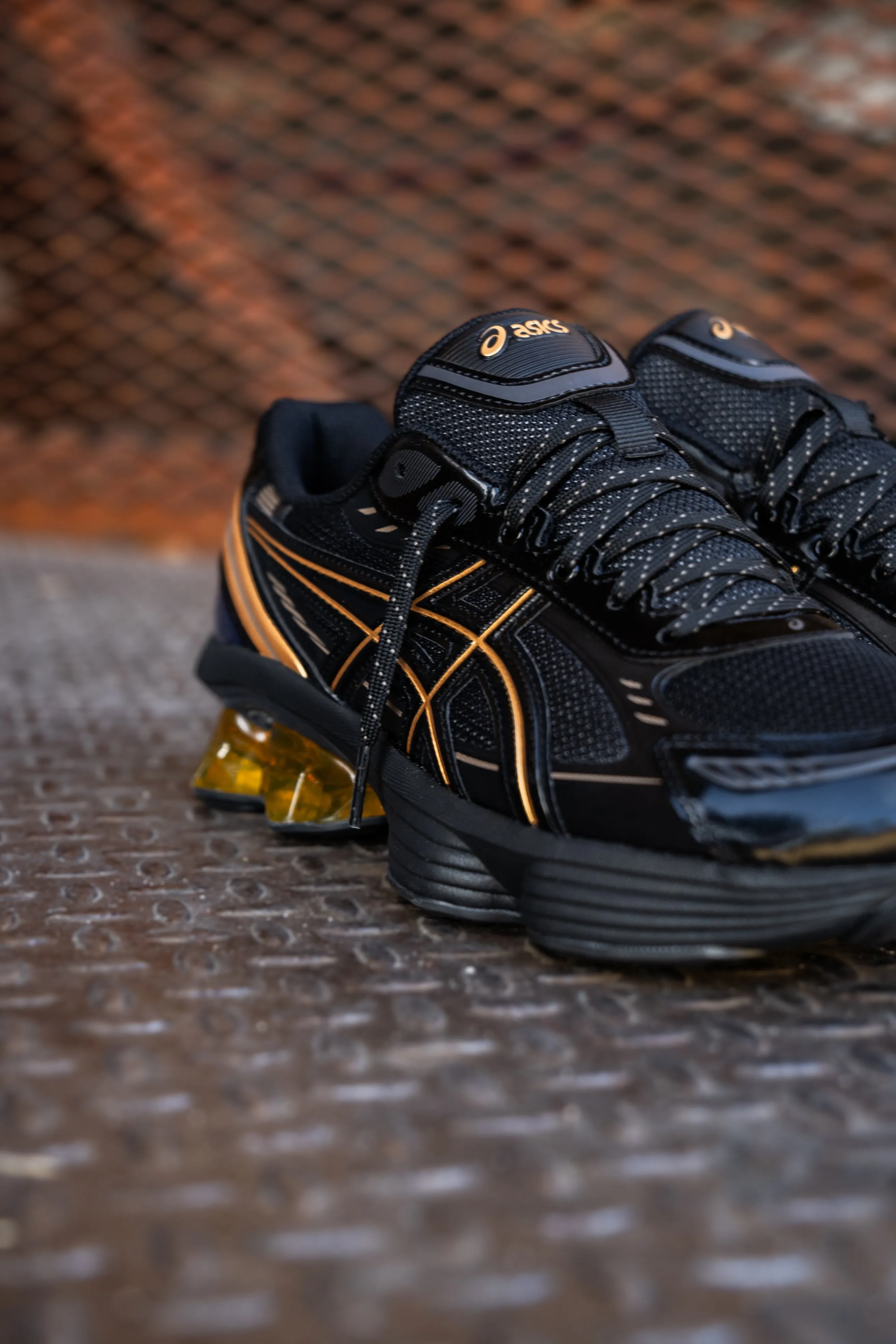 Herren Asics Gel-Kinetic Fluent (Schwarz/Gold)