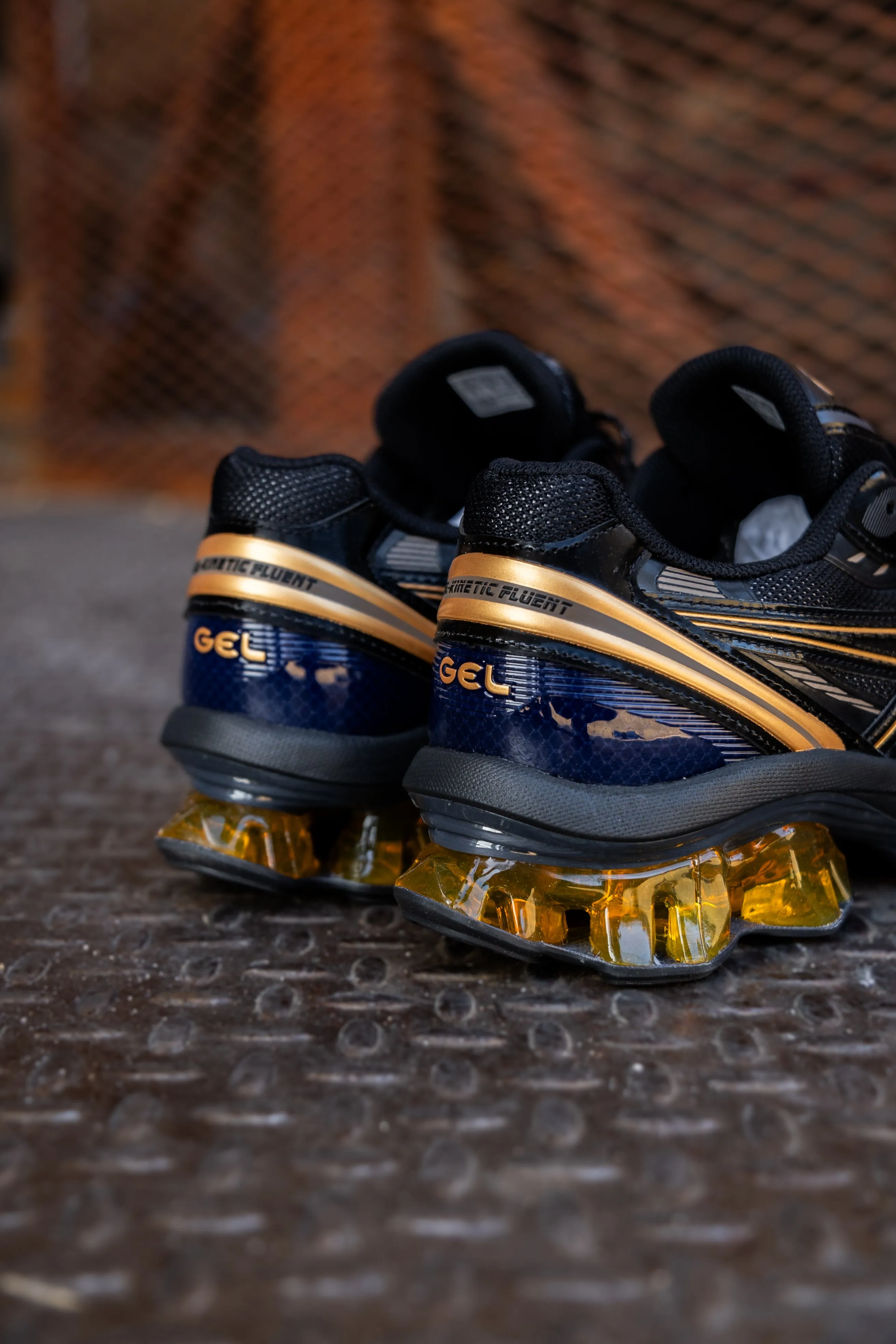 Herren Asics Gel-Kinetic Fluent (Schwarz/Gold)